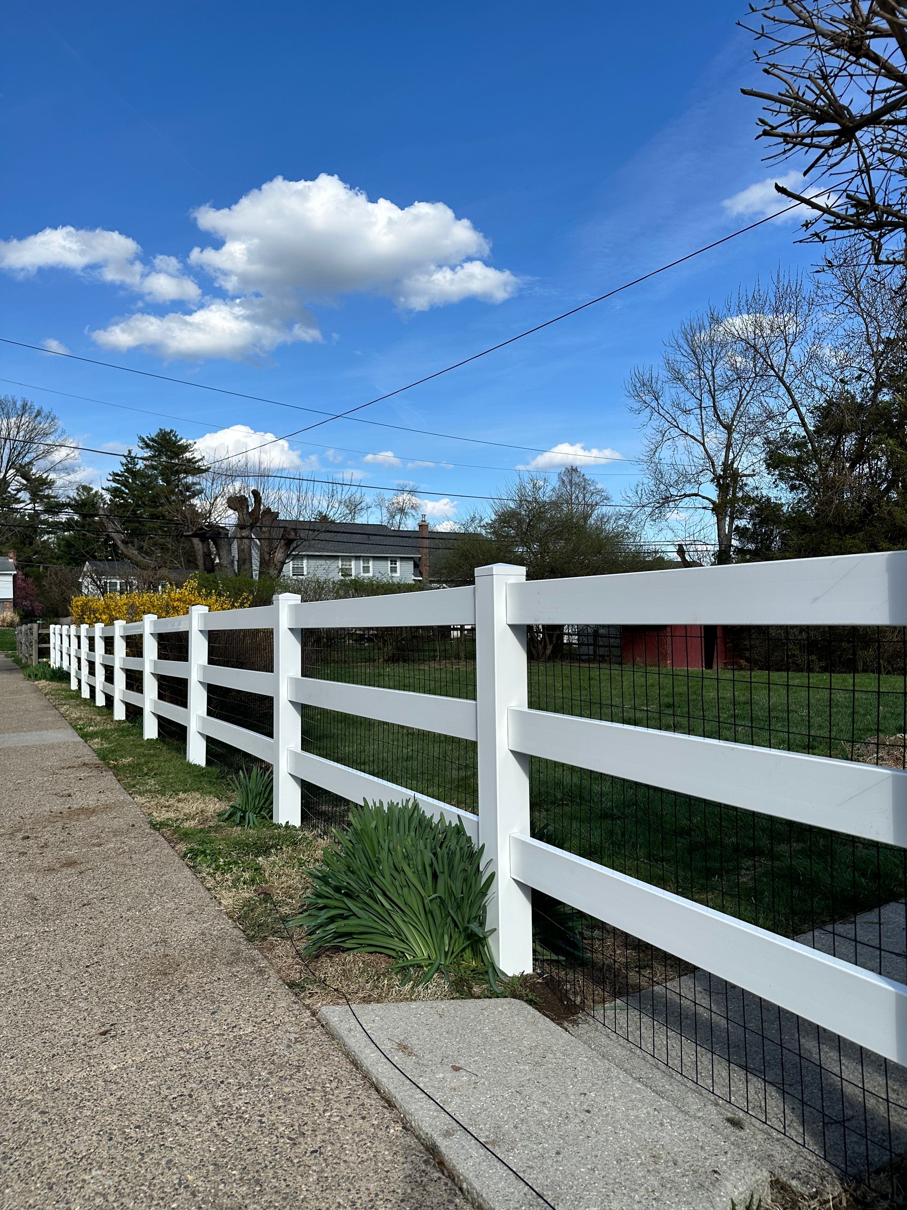 Vinyl 3-Rail Ranch Style fence with dog wire in Plymouth Meeting