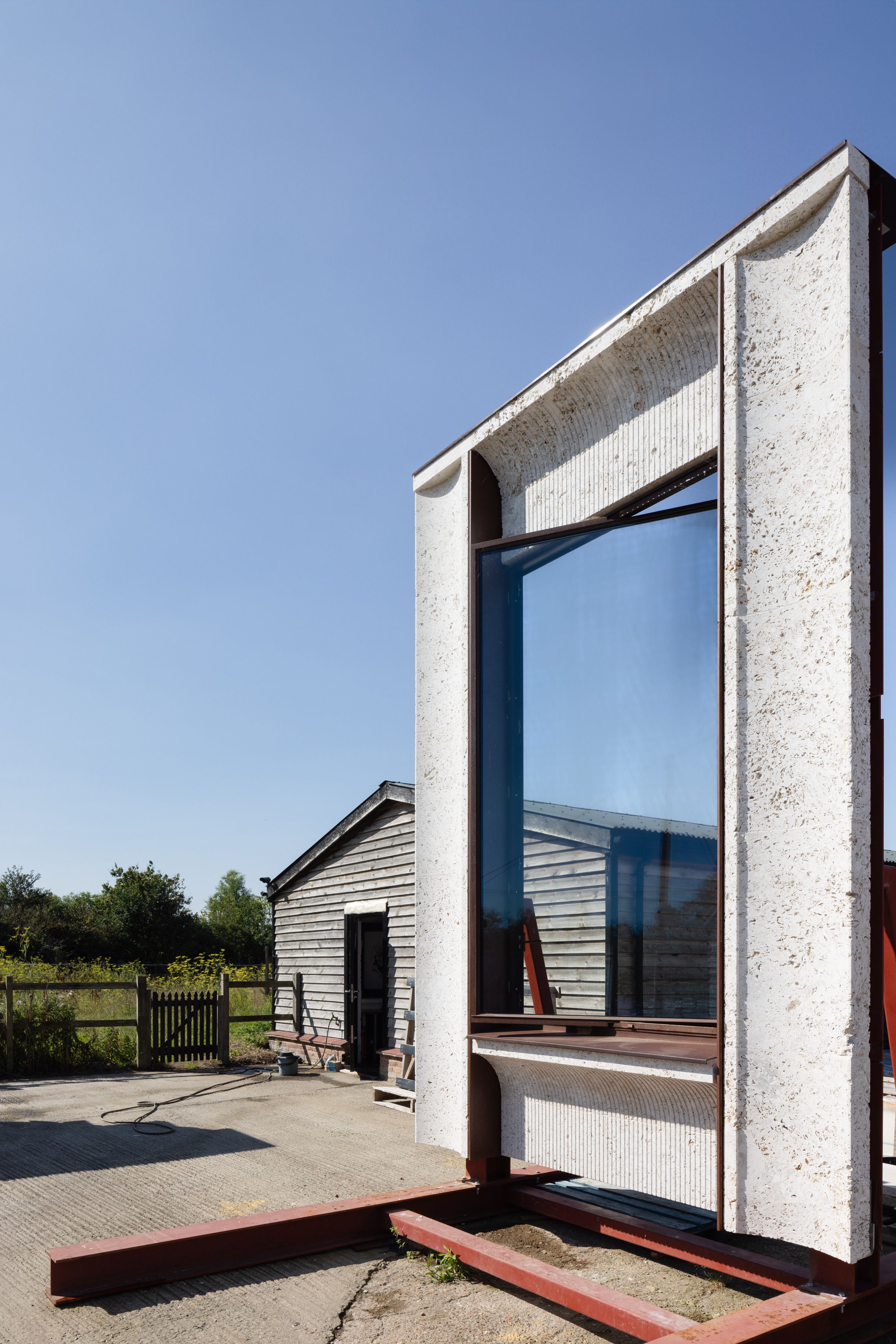 The Visual Mock Ups were initially erected Q2 2022. The design was adjusted over coming months as the team trialled patination results between conditions in Portugal where the Secco window frames were being procured, and Perivale in West-London where the architectural metalwork was made. This process was concluded by Q1 2023, and the mock ups have been in place (over 2.5 years), providing the Client, Contractor and Design Team with the confidence to progress to Construction for the façade for 25 Hanover Square, and acting as 1:1 quality benchmark for the build.
