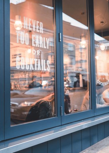 View through the window at NOVI bar and kitchen