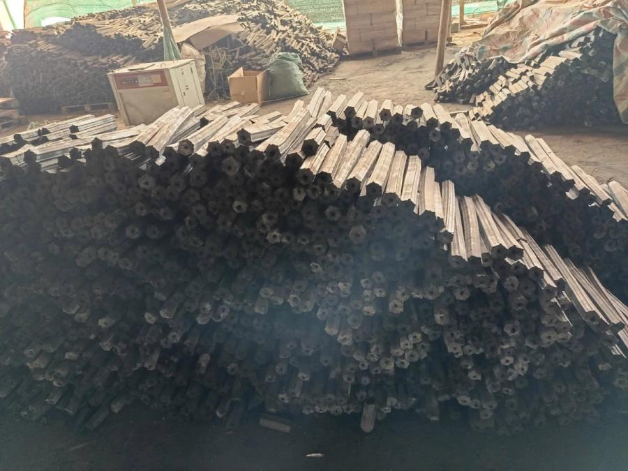 Hex sawdust charcoal in the warehouse