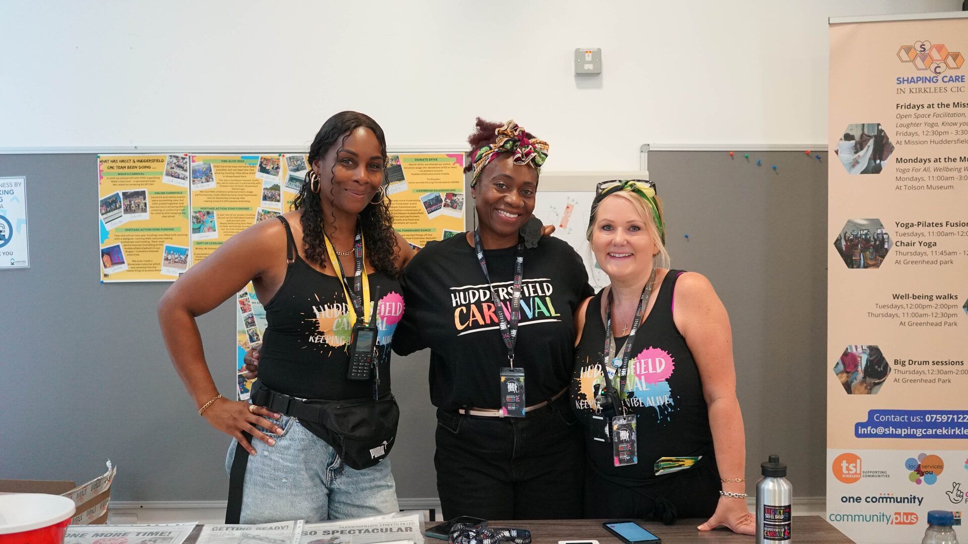 Carnival Management Committee volunteers in branded shirts before the parade.