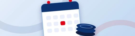 Calendrier et pile de pièces