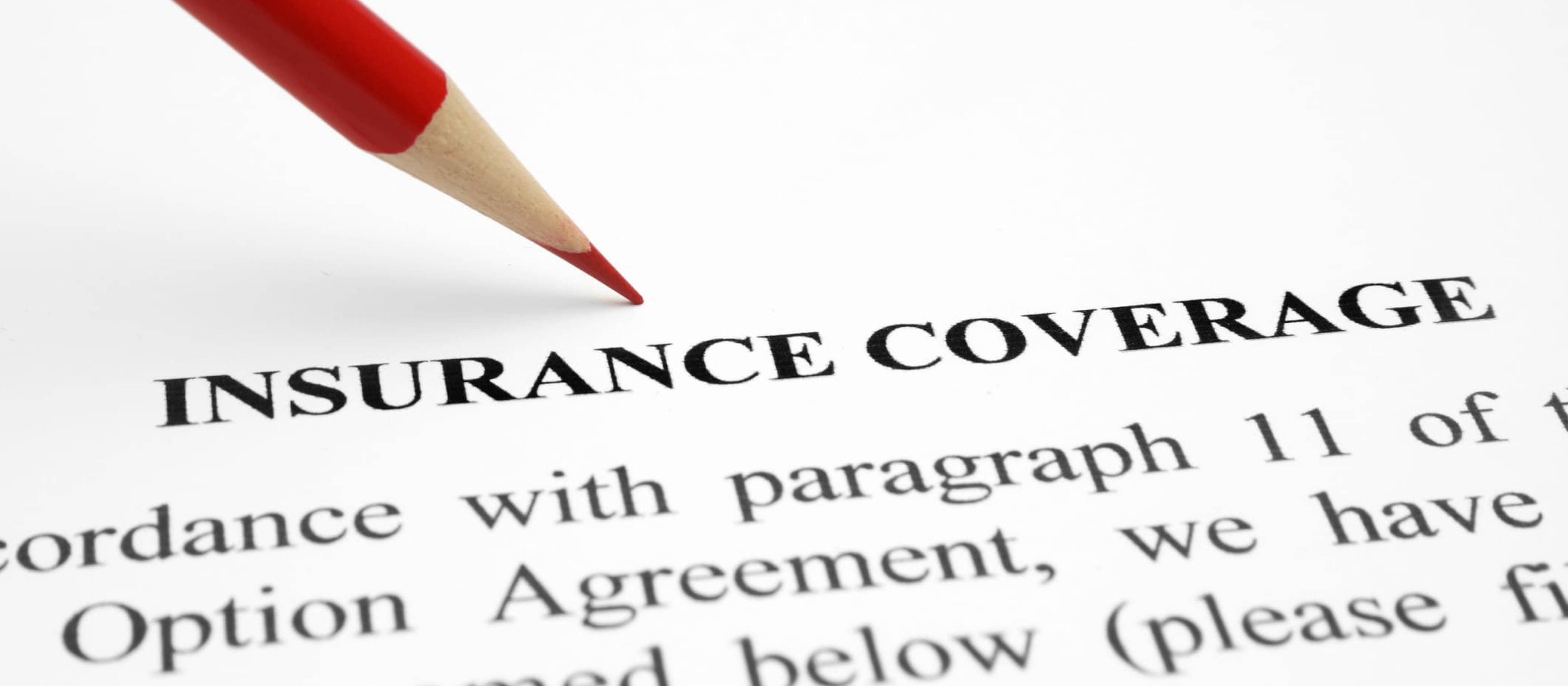 red pencil above insurance coverage text