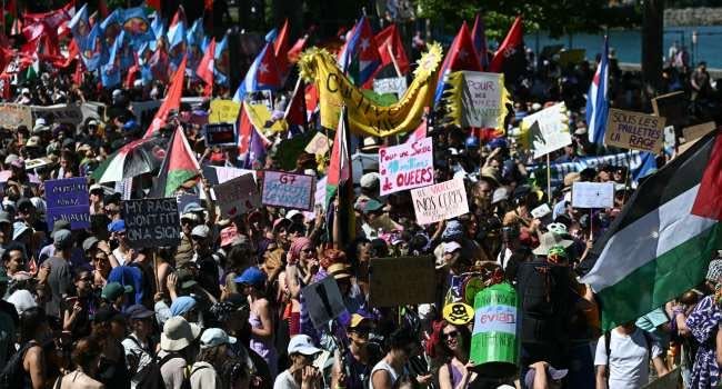 World News: Thousands Protest In Geneva Ahead Of G7 Summit In France