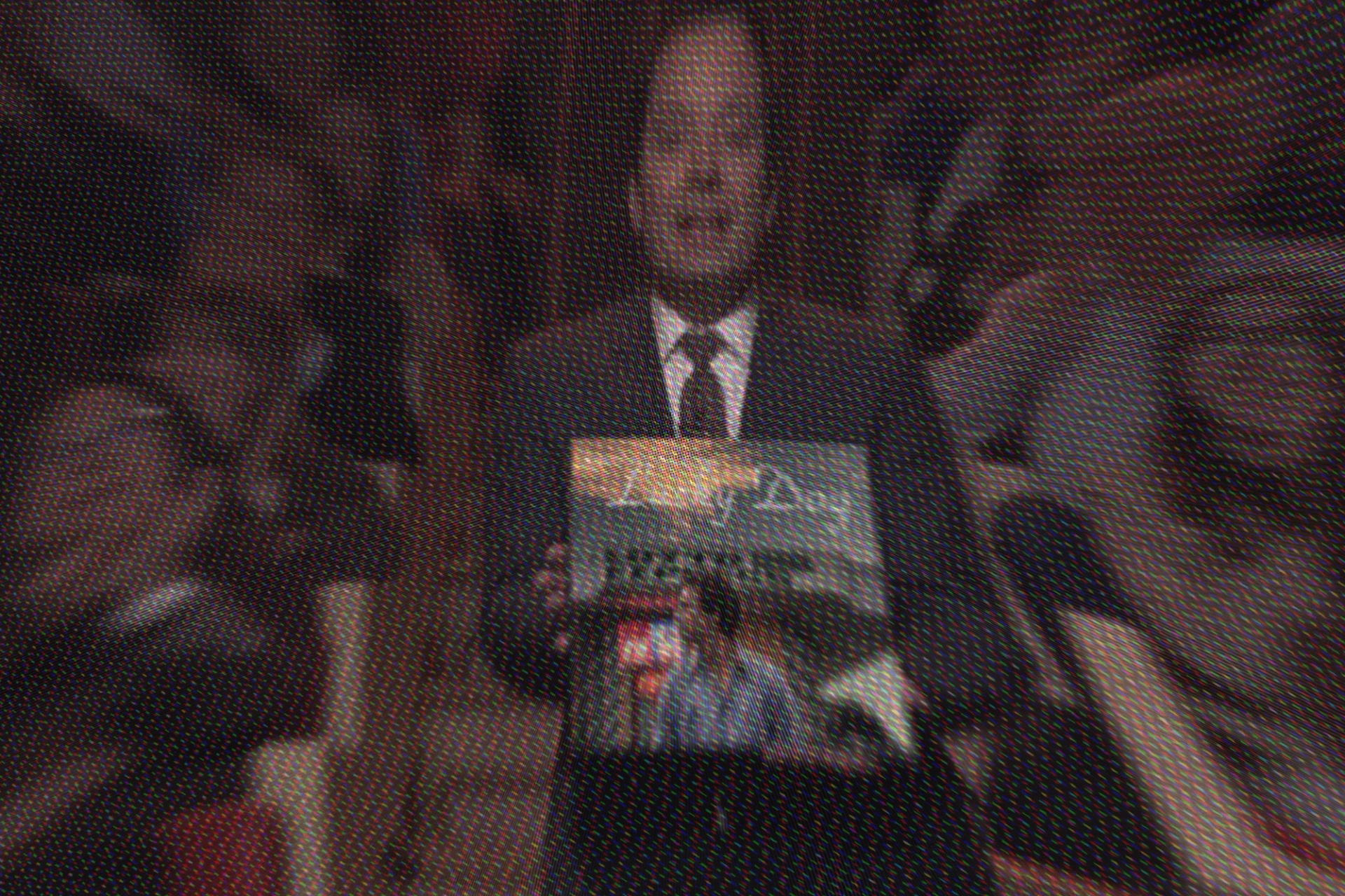 Distorted CRT Monitor Image - Fallon Holds Ben Stalets Lucky Dog Album