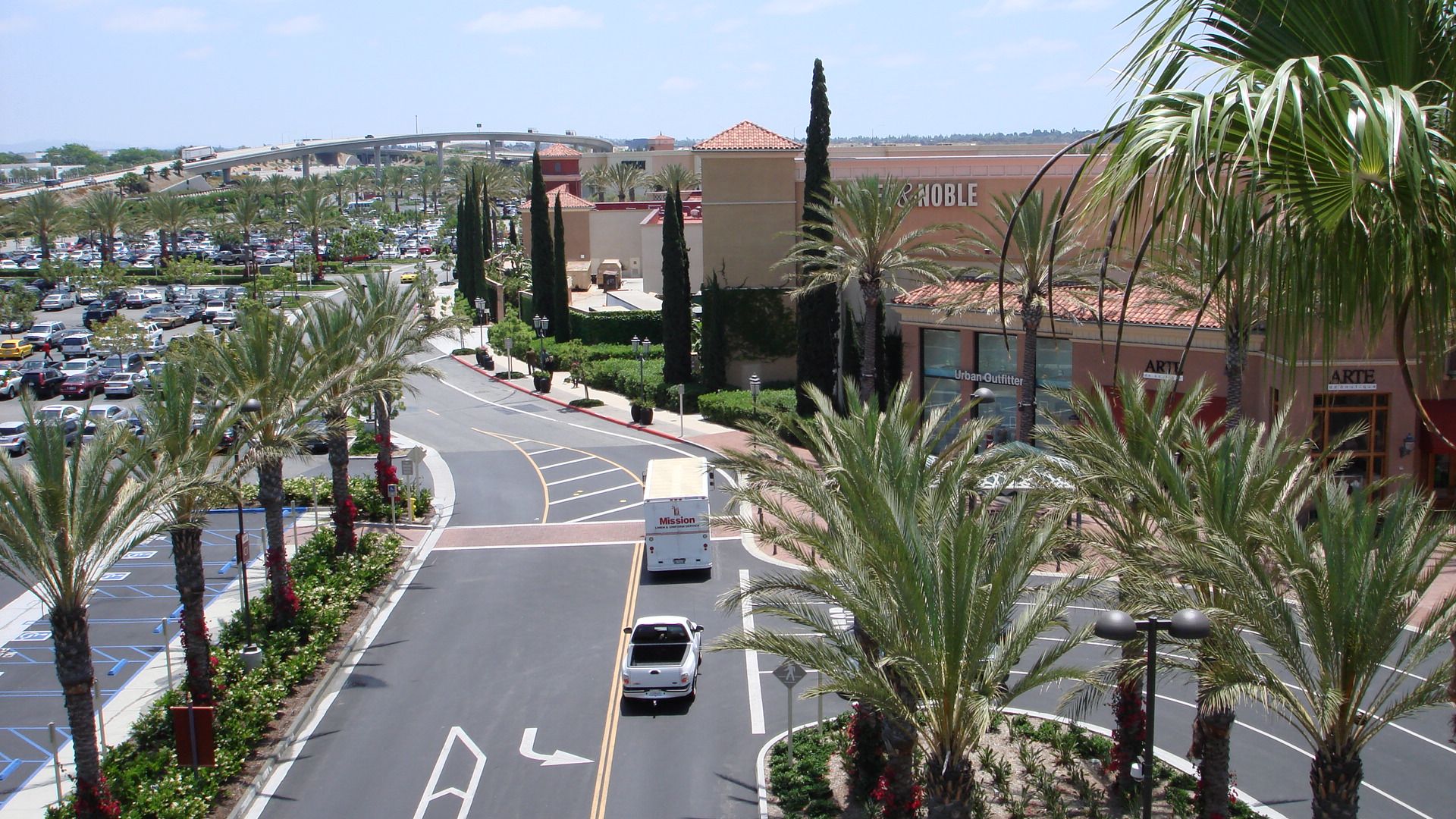 Palm-lined streets and buildings at Irvine Spectrum Center, California