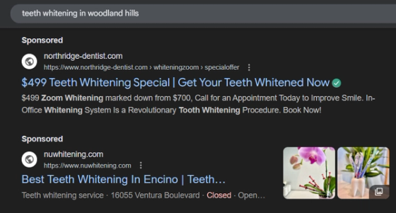 Google search results with rich sponsored listings for teeth whitening