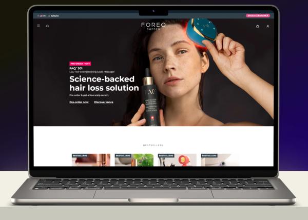 FOREO campaign landing-page mockup shown on a laptop