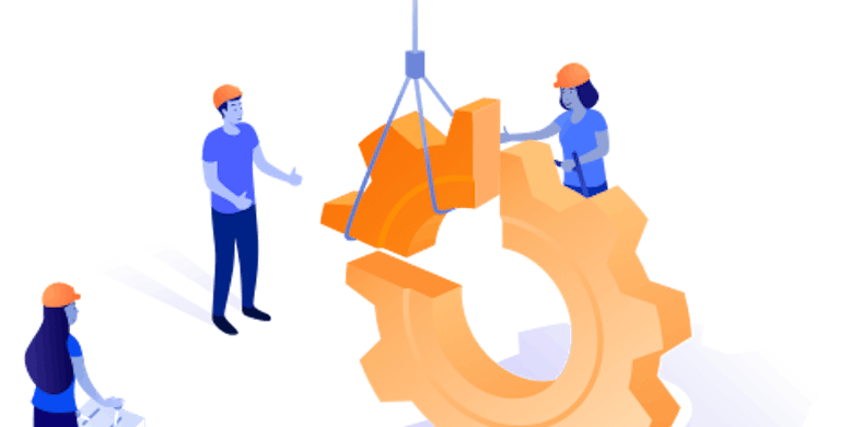 3 people lowering a piece of a cog onto the cog