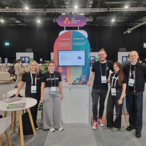 the team from The Adaptavist Group at their booth at Elevate 2025 in London