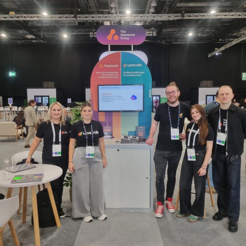 the team from The Adaptavist Group at their booth at Elevate 2025 in London