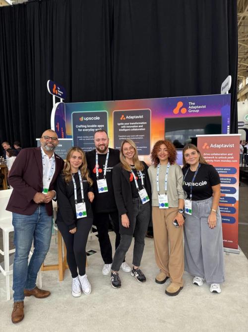 photograph of team members from The Adaptavist Group in front of their booth at Elevate '25 in NYC