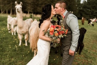 Happy bride in a classic outdoor wedding dress from Aleana’s Bridal