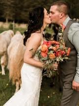 Happy bride in a classic outdoor wedding dress from Aleana’s Bridal