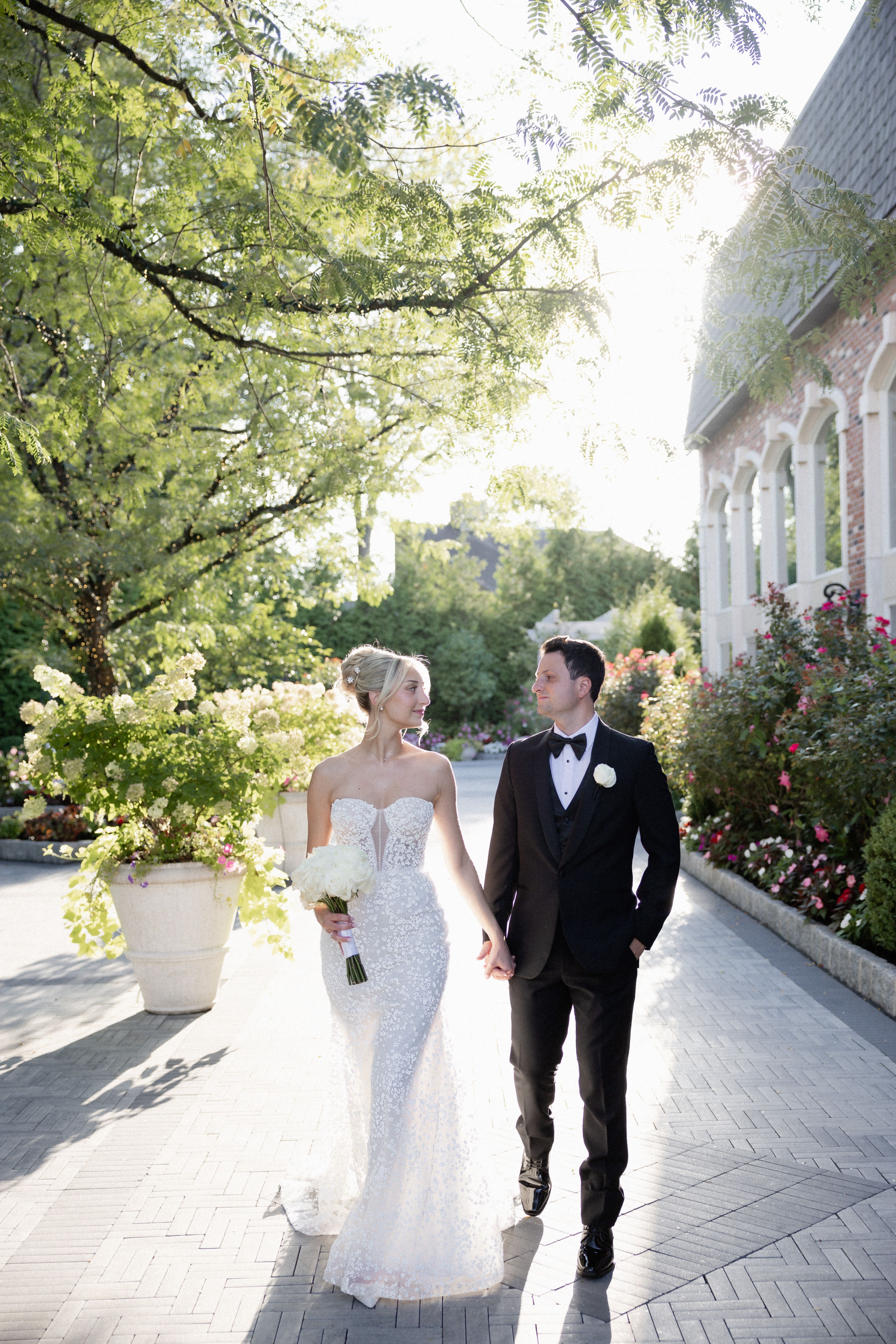 Happy bride in a classic strapless wedding dress from Aleana’s Bridal