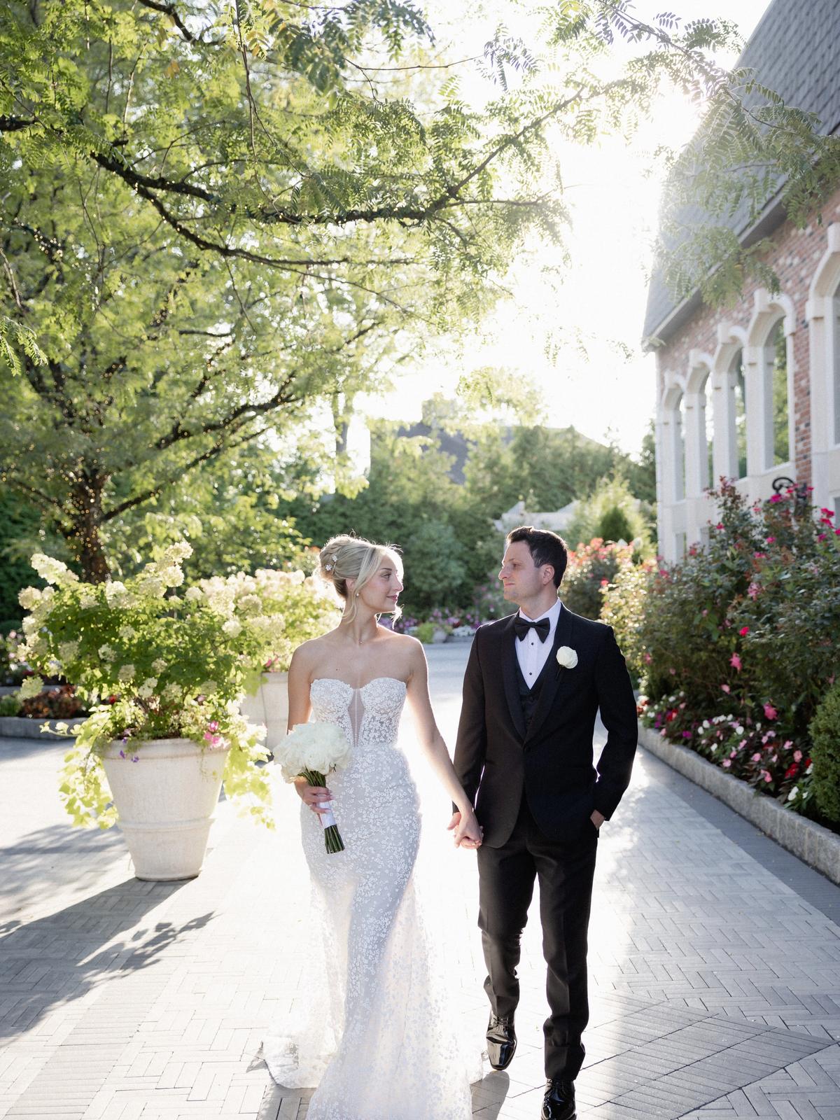 Happy bride in a classic strapless wedding dress from Aleana’s Bridal