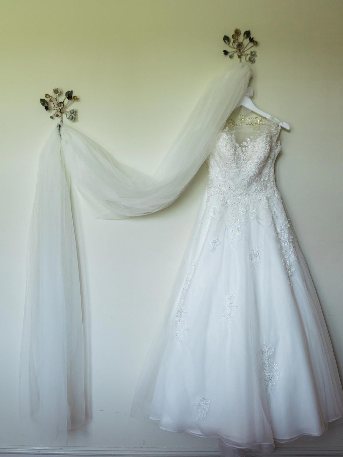Bridal wedding dress with lace detailing from Aleana’s Bridal
