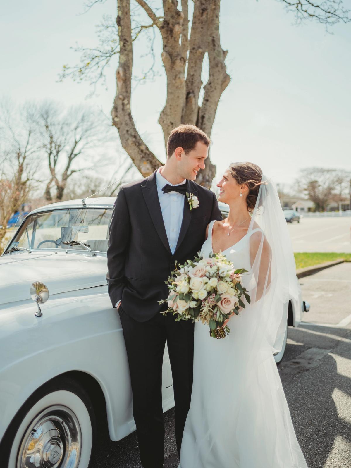 Bride celebrating her wedding day in a romantic designer gown from Aleana’s Bridal