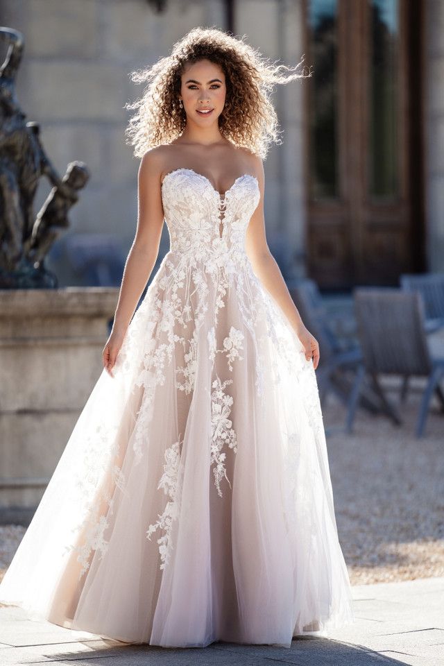 "A" line lace bridal dress available at Aleana's Bridal