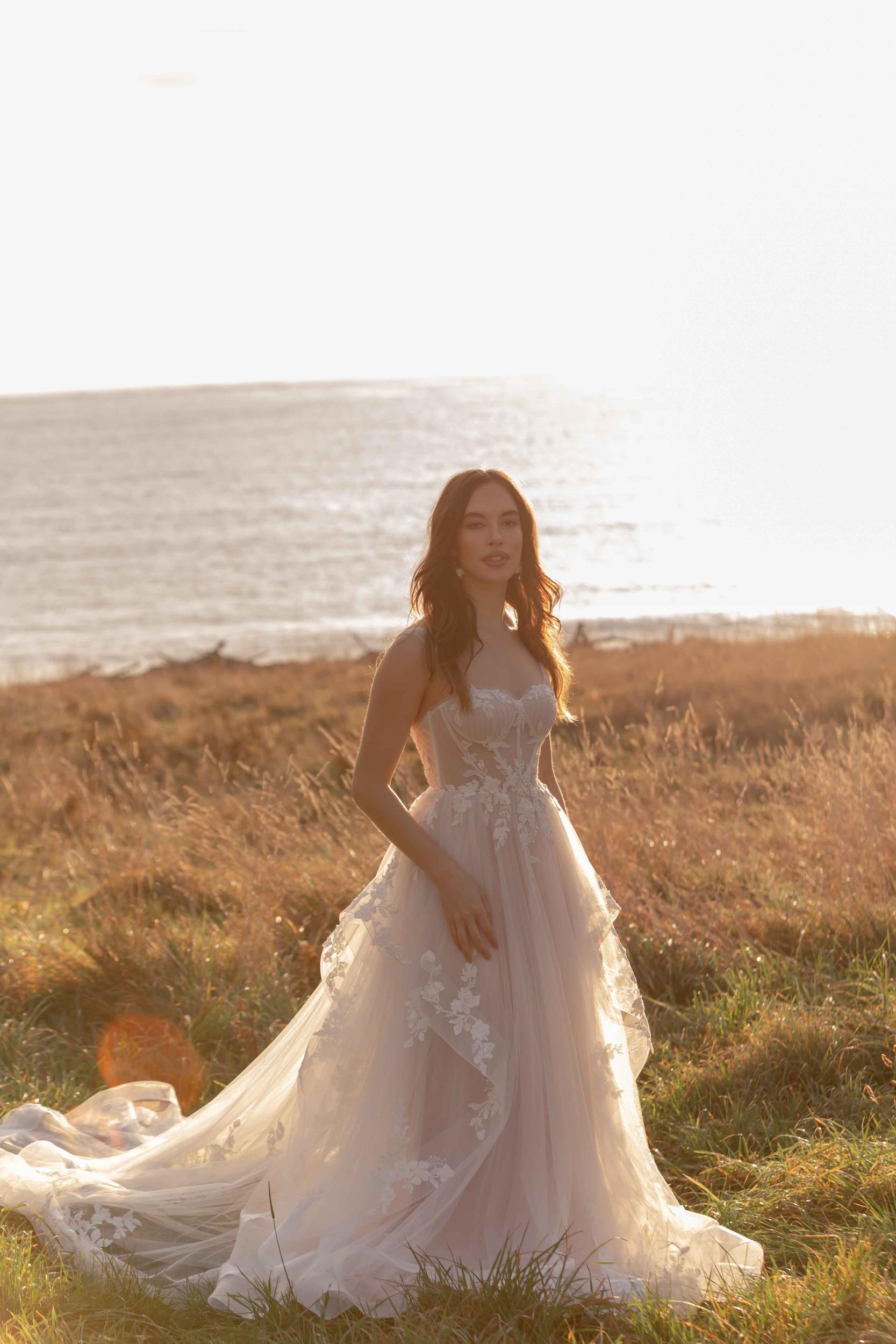 "A" line lace bridal dress available at Aleana's Bridal