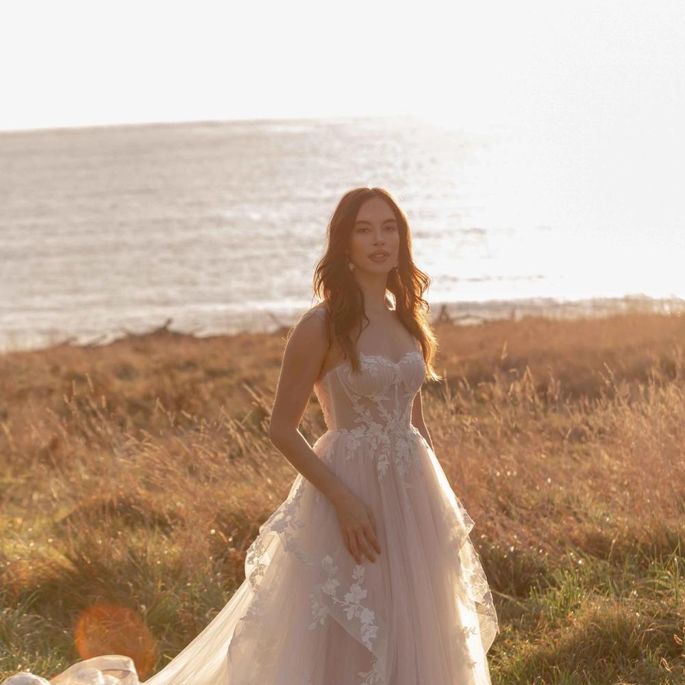 "A" line lace bridal dress available at Aleana's Bridal