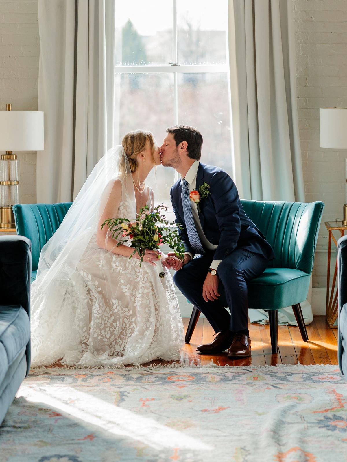 Happy bride in a classic lace wedding dress from Aleana’s Bridal