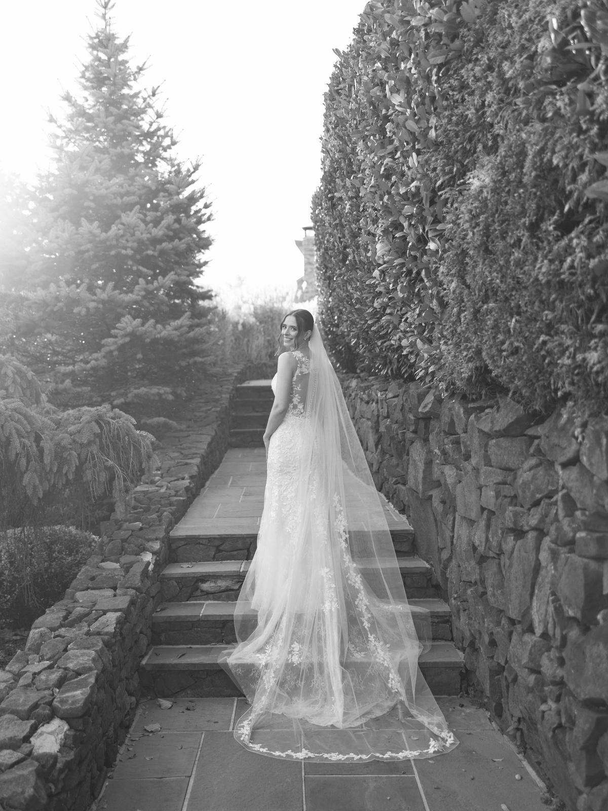 Happy bride in a lace wedding dress from Aleana’s Bridal