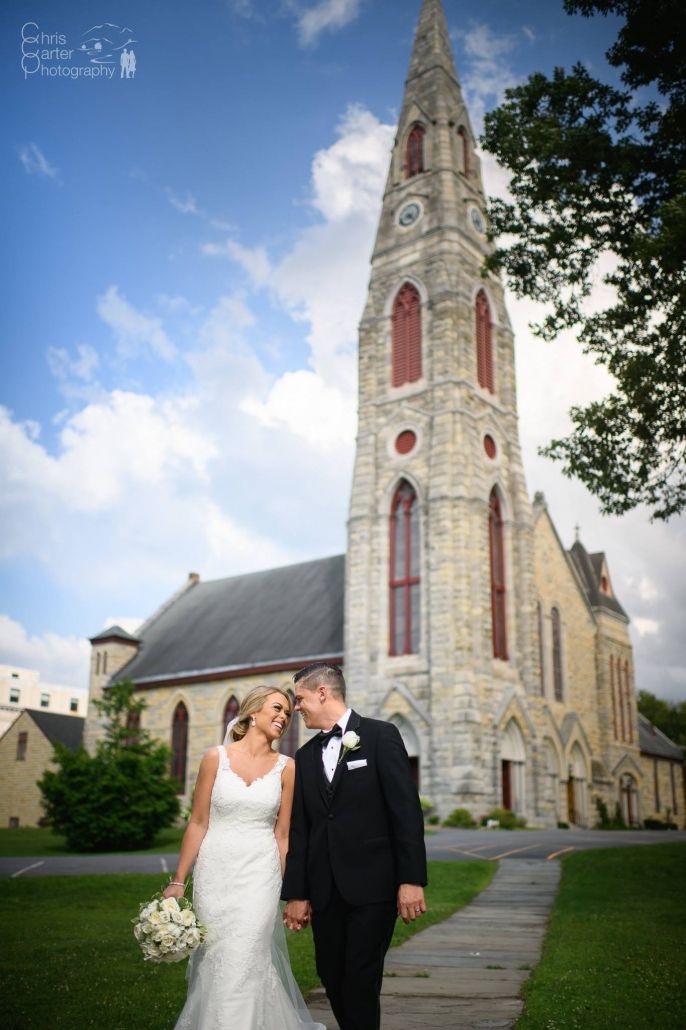 Happy bride in a elegant wedding dress from Aleana’s Bridal