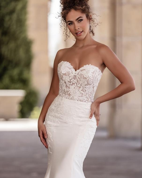 Lace mermaid wedding dress by Allure in bridal boutique