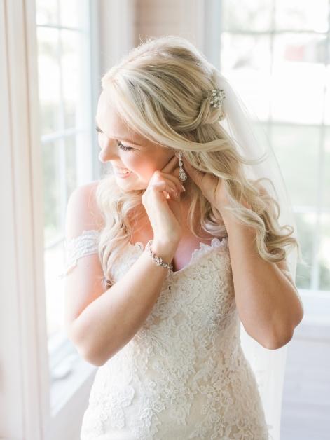 Romantic bridal portrait featuring a designer wedding gown from Aleana’s Bridal.
