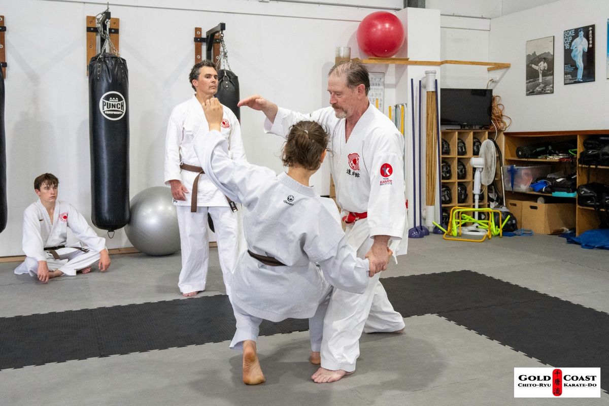 Karate students training in a focused dojo environment