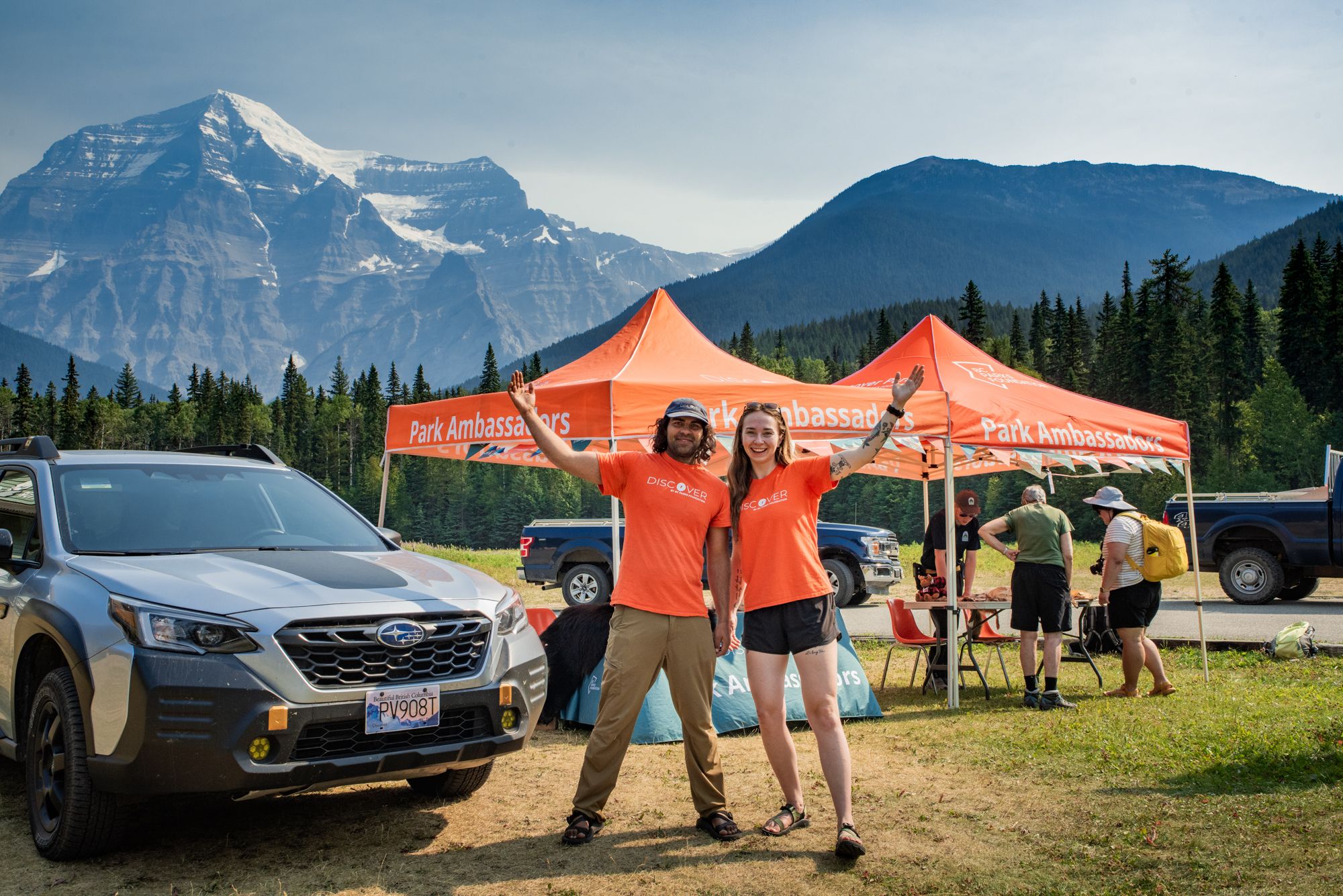 Discover Parks Ambassadors pose outside a booth at Mount Robson