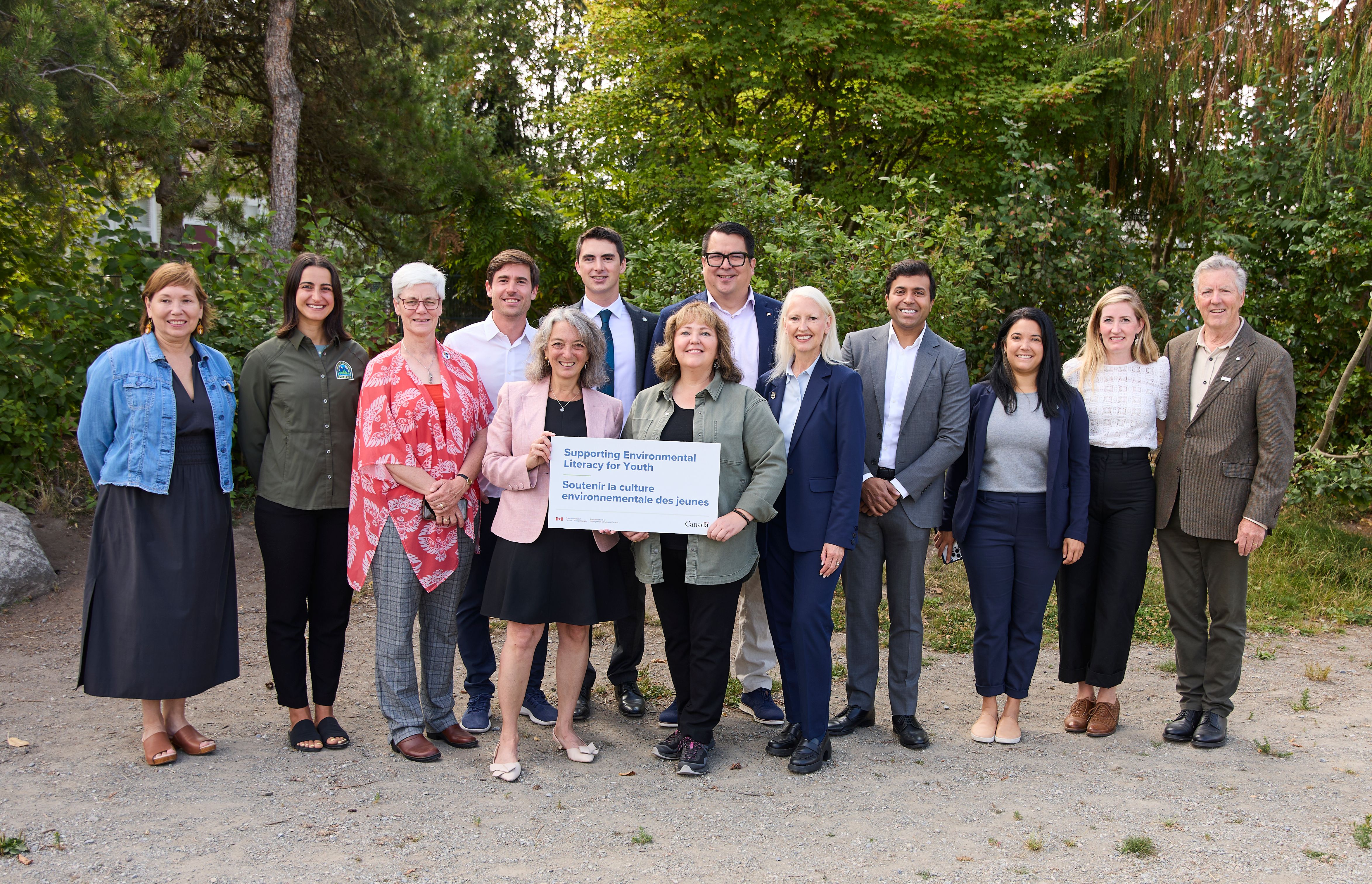 Group of people celebrating the launch of Learning by Nature