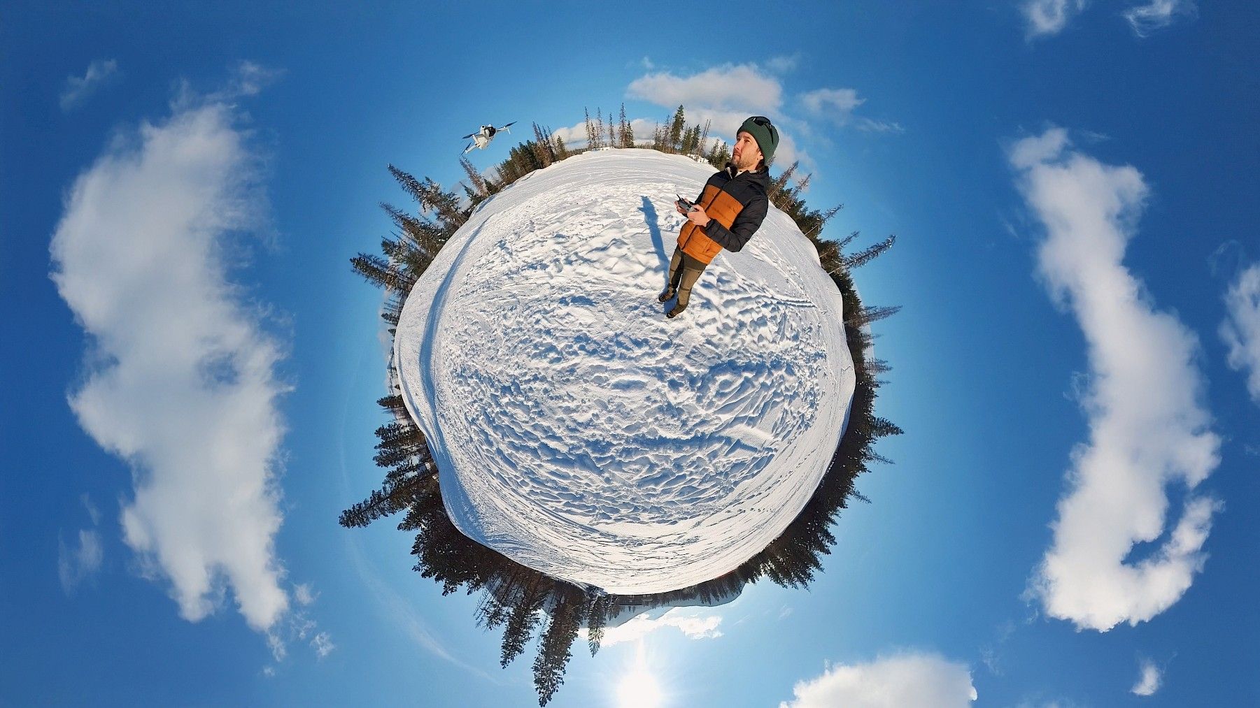 Aaron captures himself using a drone to take a 360-degree photo within a 360-degree photo.