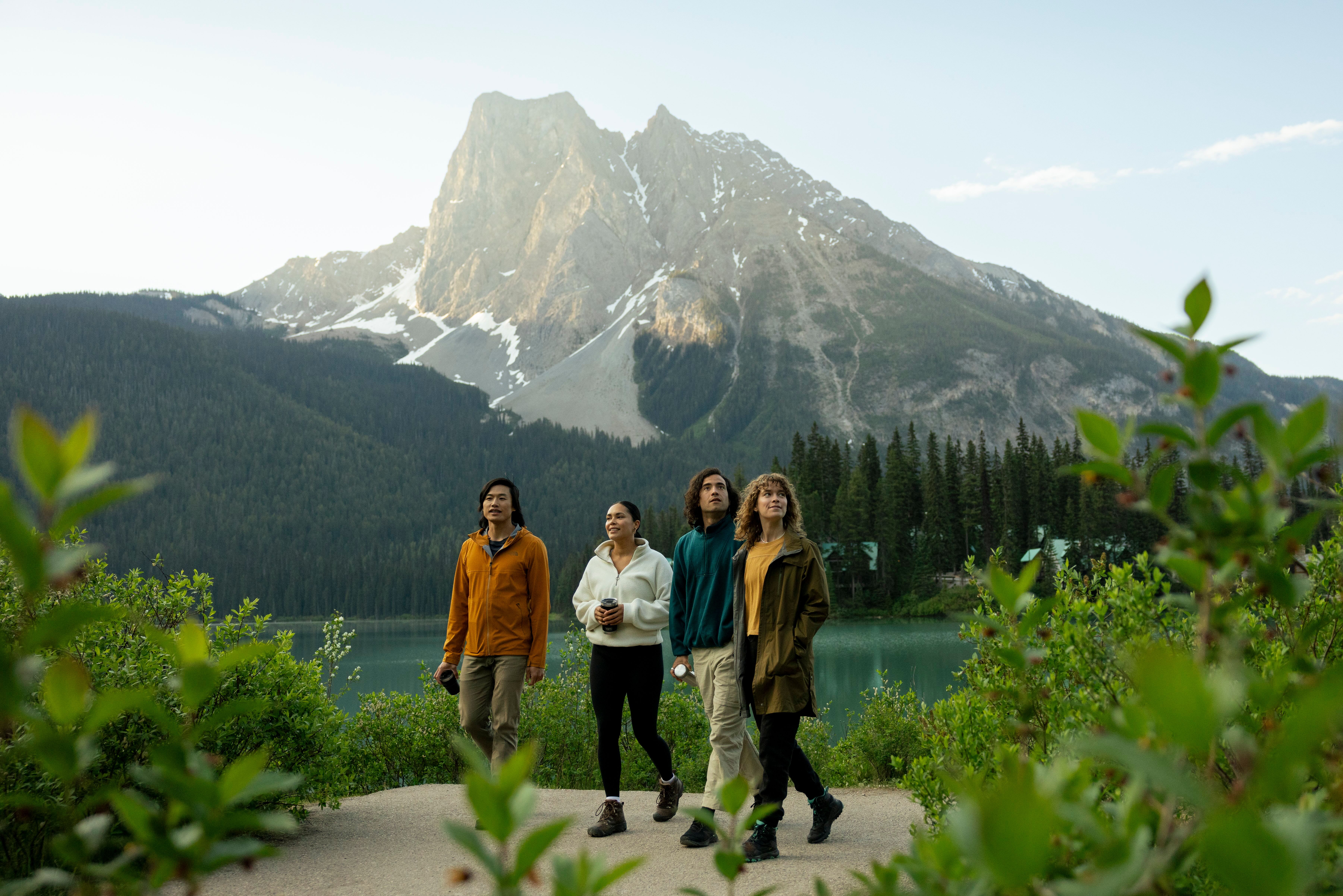 A group of people walk in nature