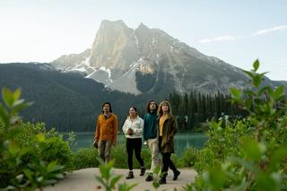 A group of people walk in nature