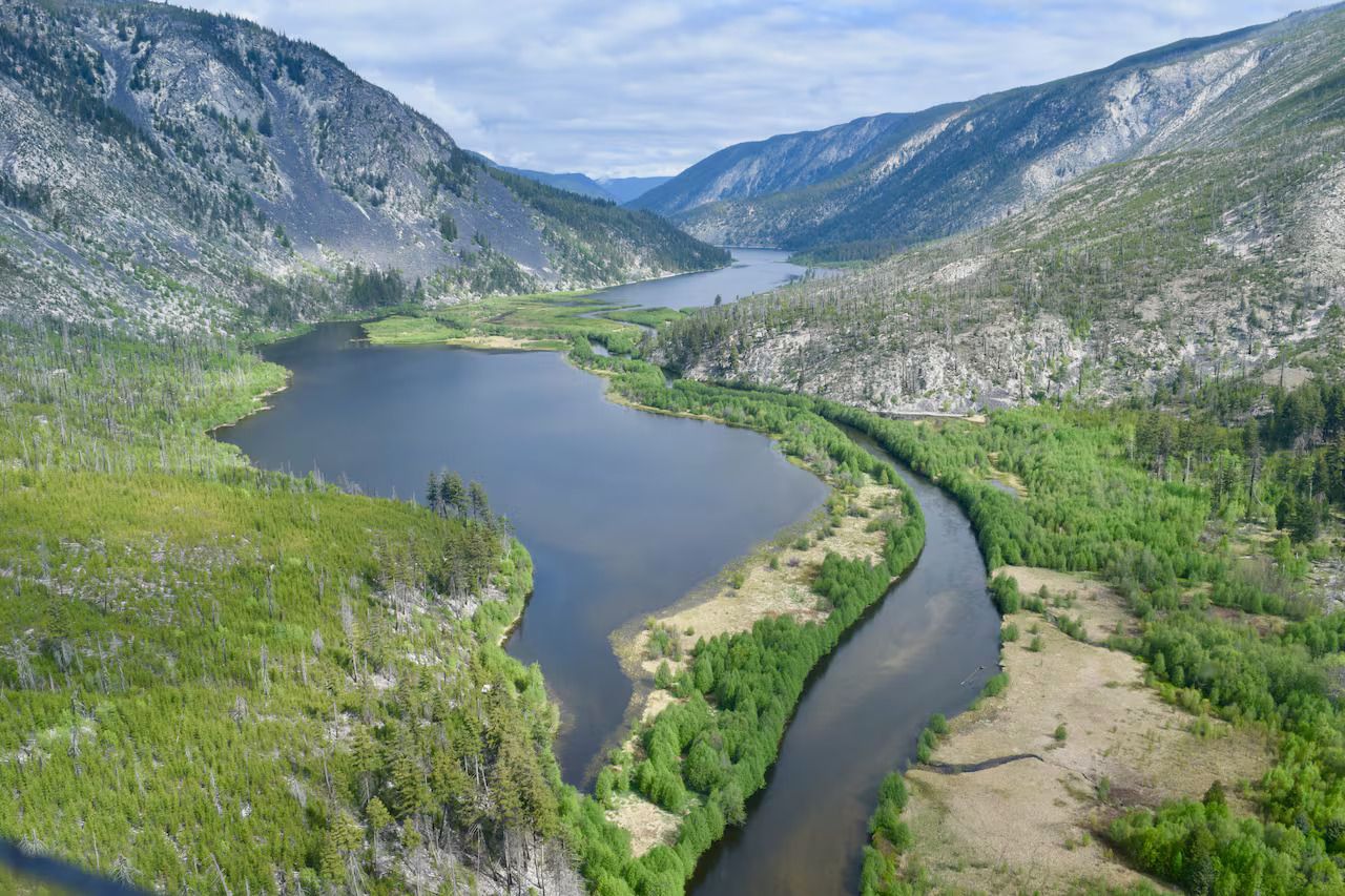 Aerial image of Lonesome Lake and surrounding mountains