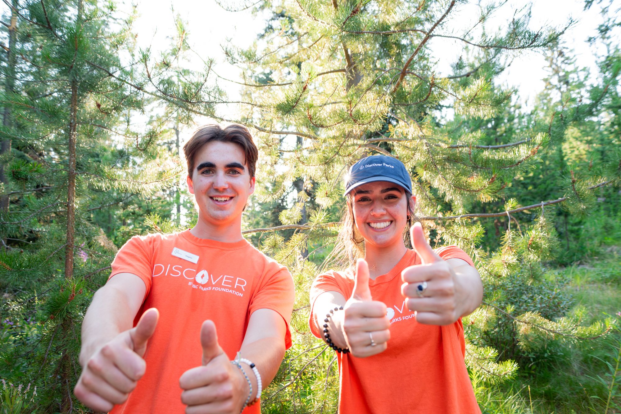 Discover Parks Ambassadors give thumbs up to camera