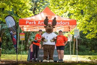 Discover Parks Ambassadors pose with Jerry the Moose