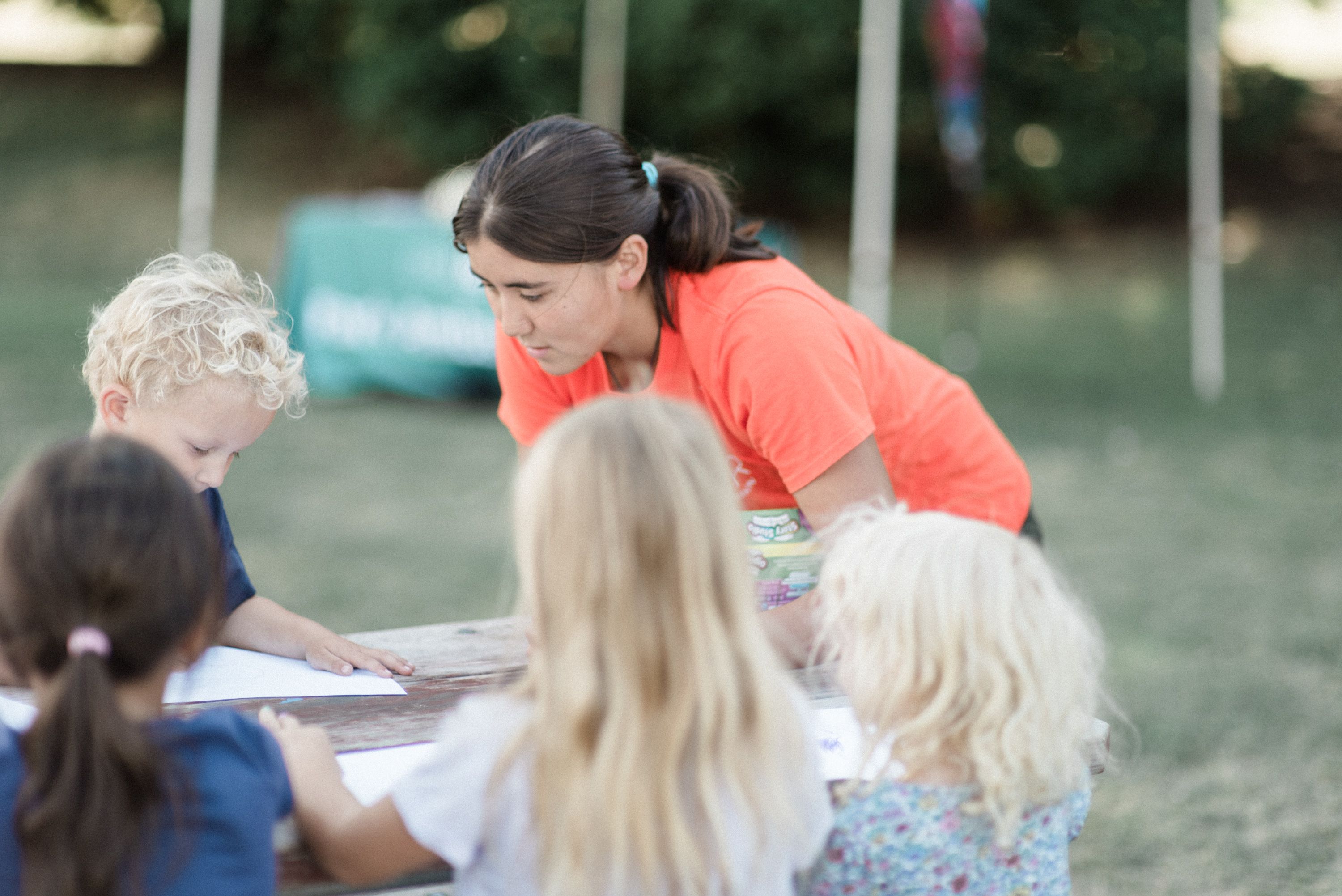 A Discover Parks Ambassador speaks to a group of children