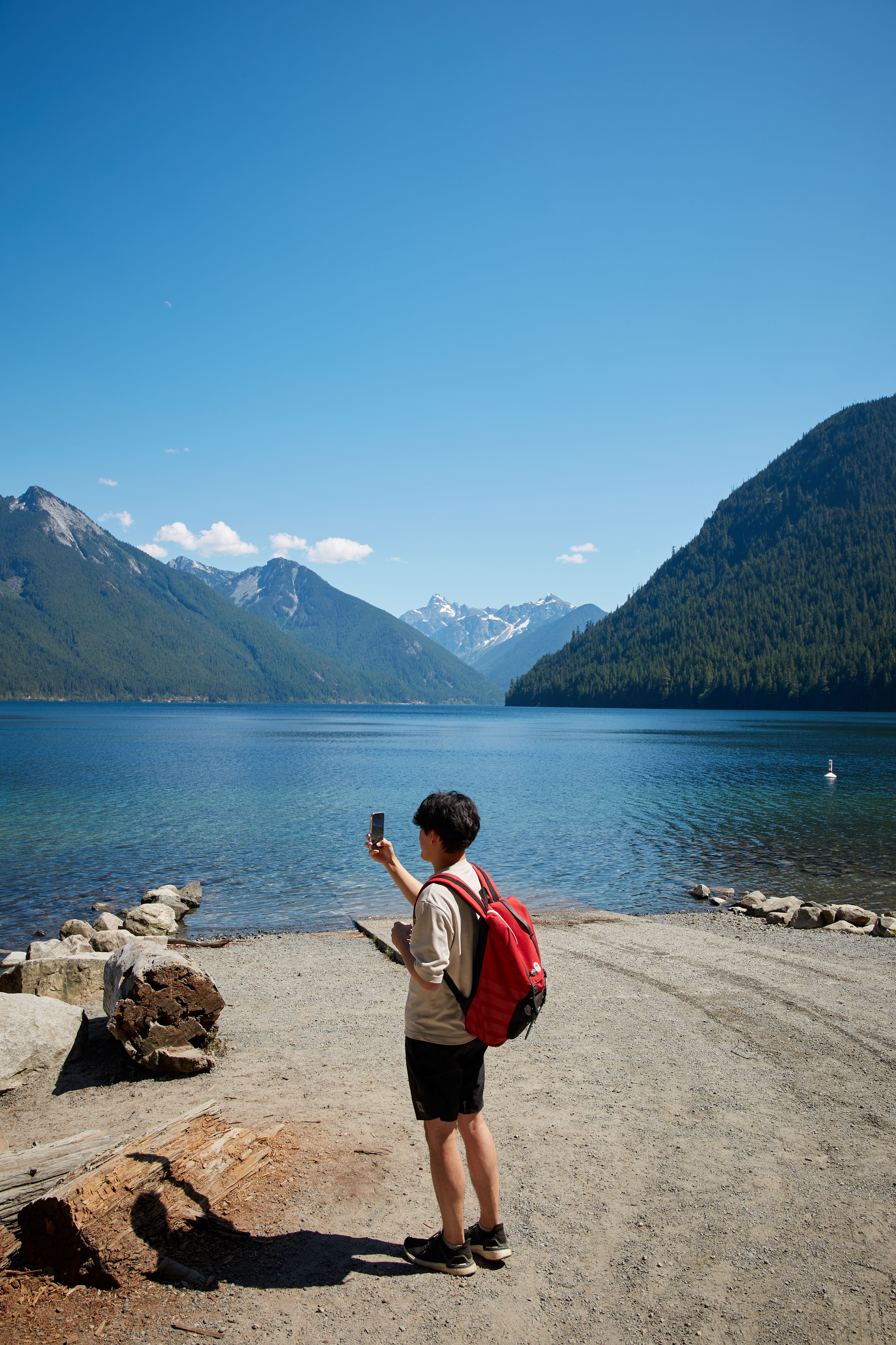 Here’s Kai today trying to capture the beauty of Sx̱ótsaqel/Chilliwack Lake Park.