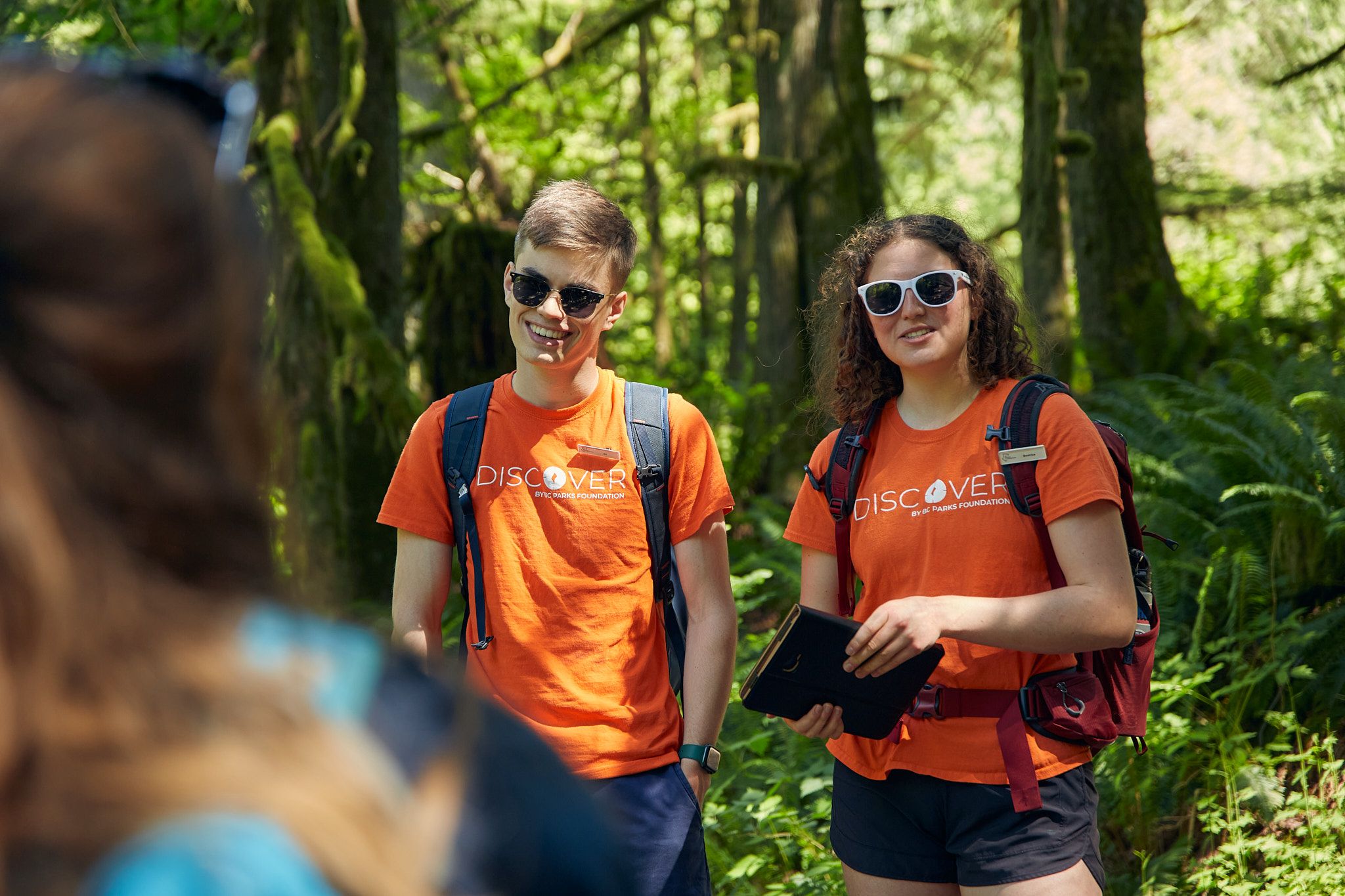 DPAs interact with visitors on a Nature Wak