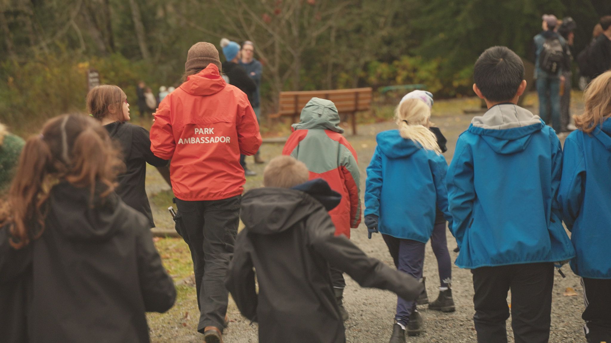 Discover Parks Ambassador leads children through nature walk