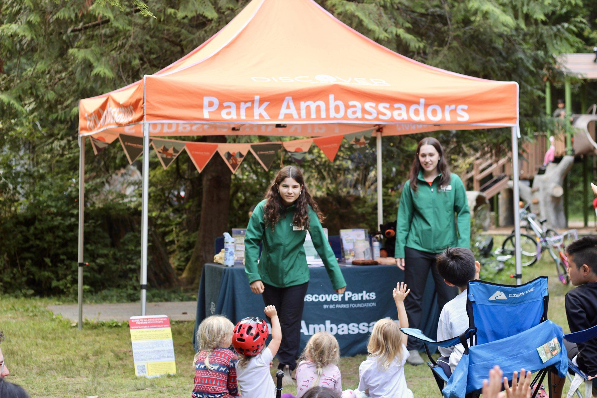 Discover Parks Ambassadors hosting a nature talk at their booth in Golden Ears Park.