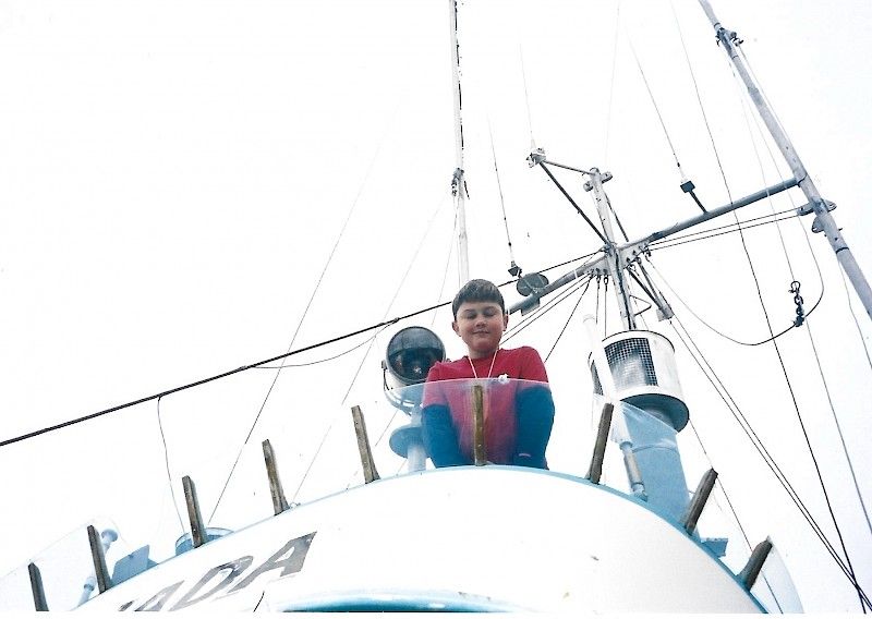 Kid on a boat