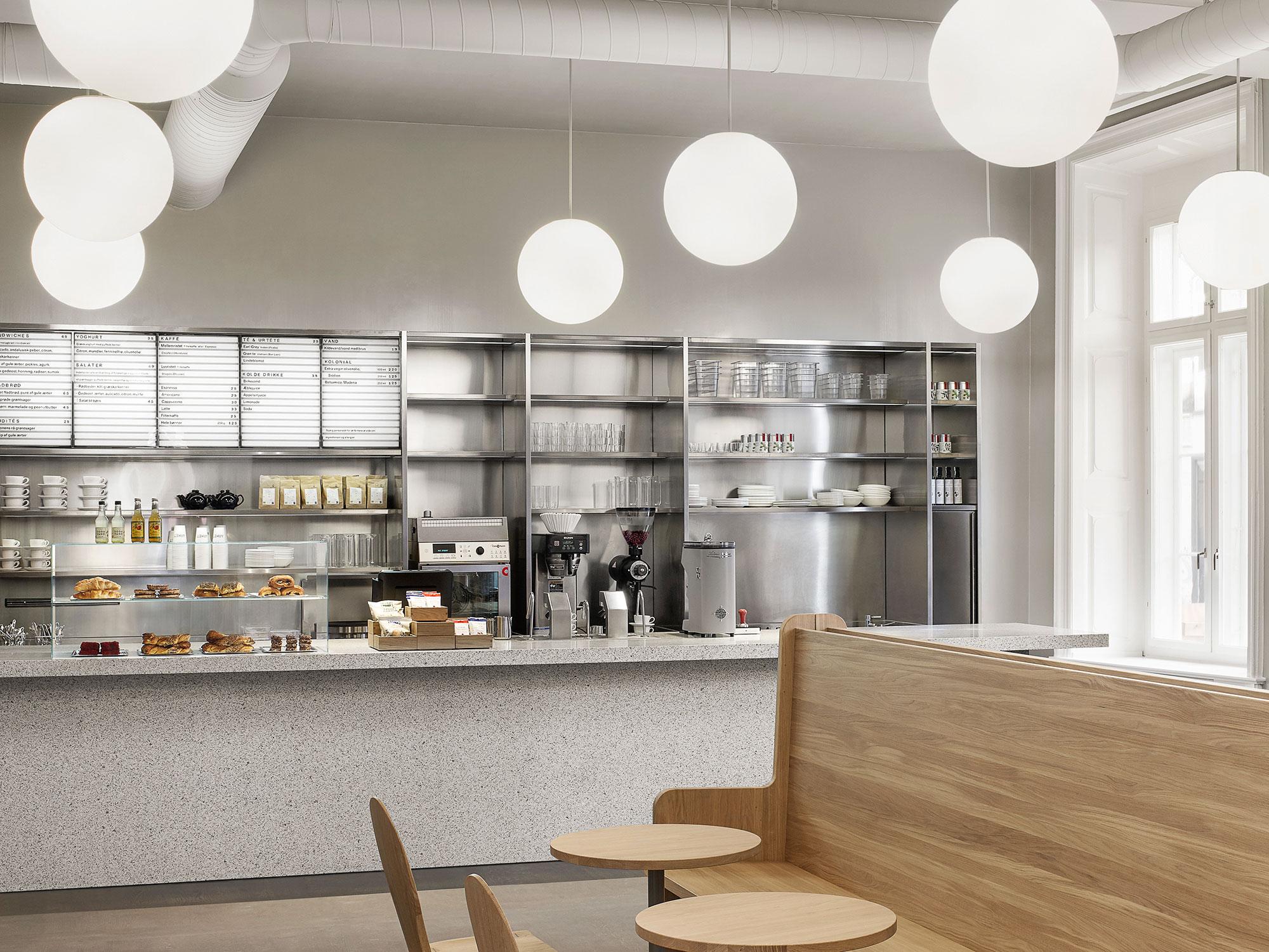 Interior design by Halleroed for Arket in Brussels, Copenhagen, London — image 3 of 5