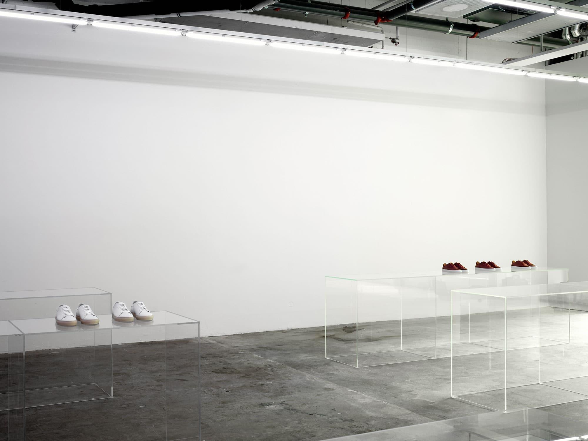 Interior design by Halleroed for Axel Arigato in Norrmalmstorg, Stockholm — image 9 of 9