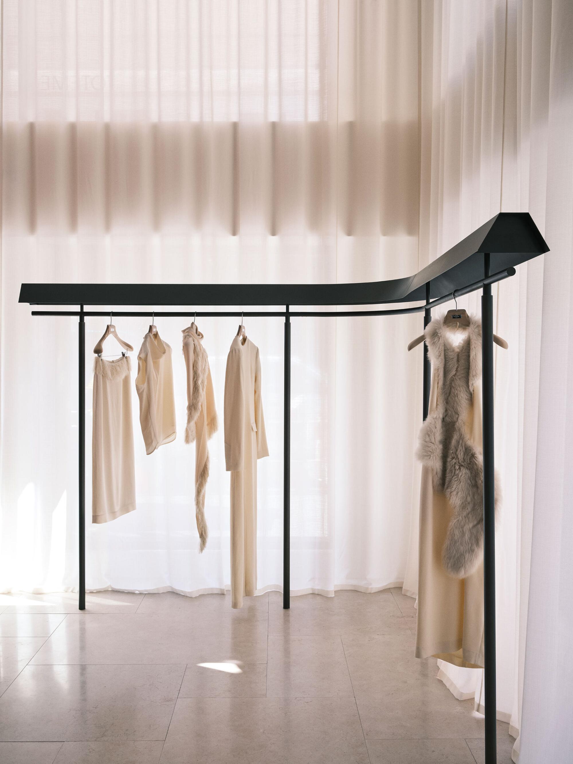 Interior design by Halleroed for Toteme in 829 Madison Ave , New York — image 5 of 10