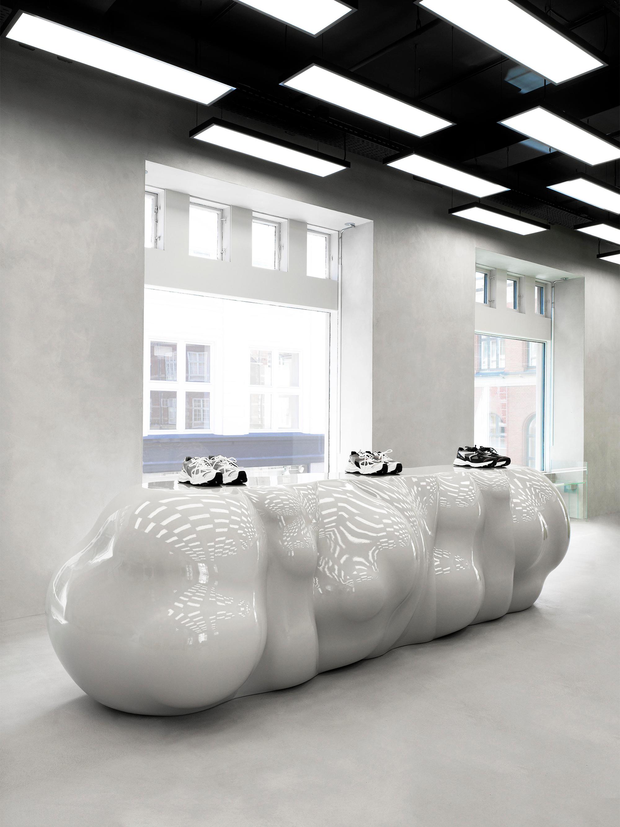 Interior design by Halleroed for Axel Arigato in Pilestræde 16, Copenhagen — image 13 of 16