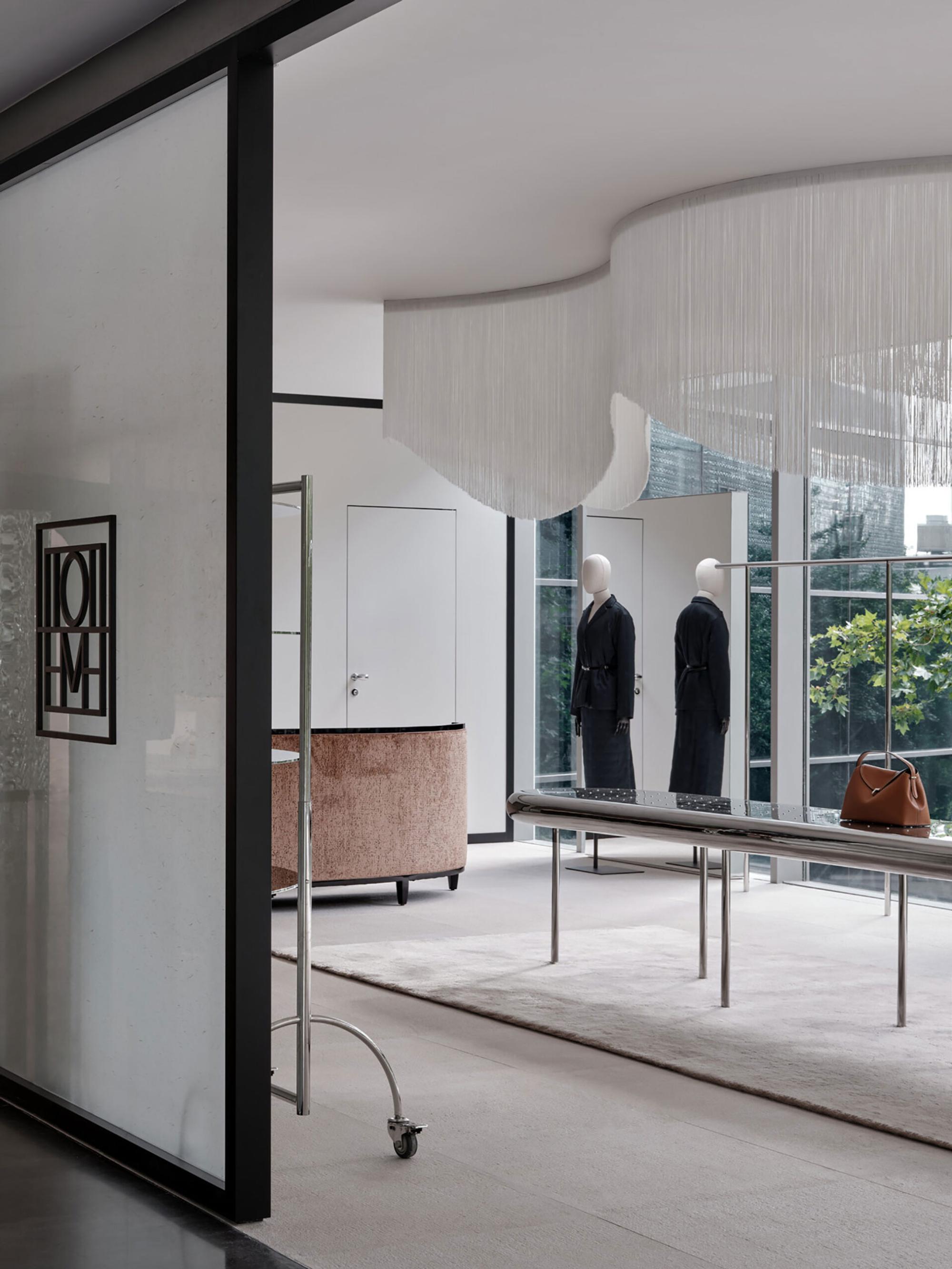 Interior design by Halleroed for Toteme in 1601 Nanjing West Road, Shanghai — image 3 of 6